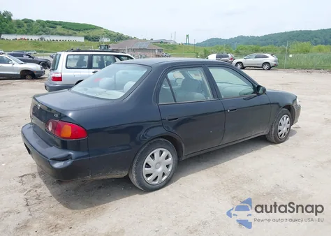 2002 Toyota Corolla Ce из США, поврежденный, VIN 2T1BR12E02C518874